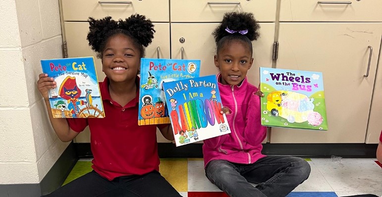 Students holding books